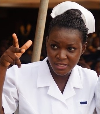 An African Community Health Nurse at work outdoors